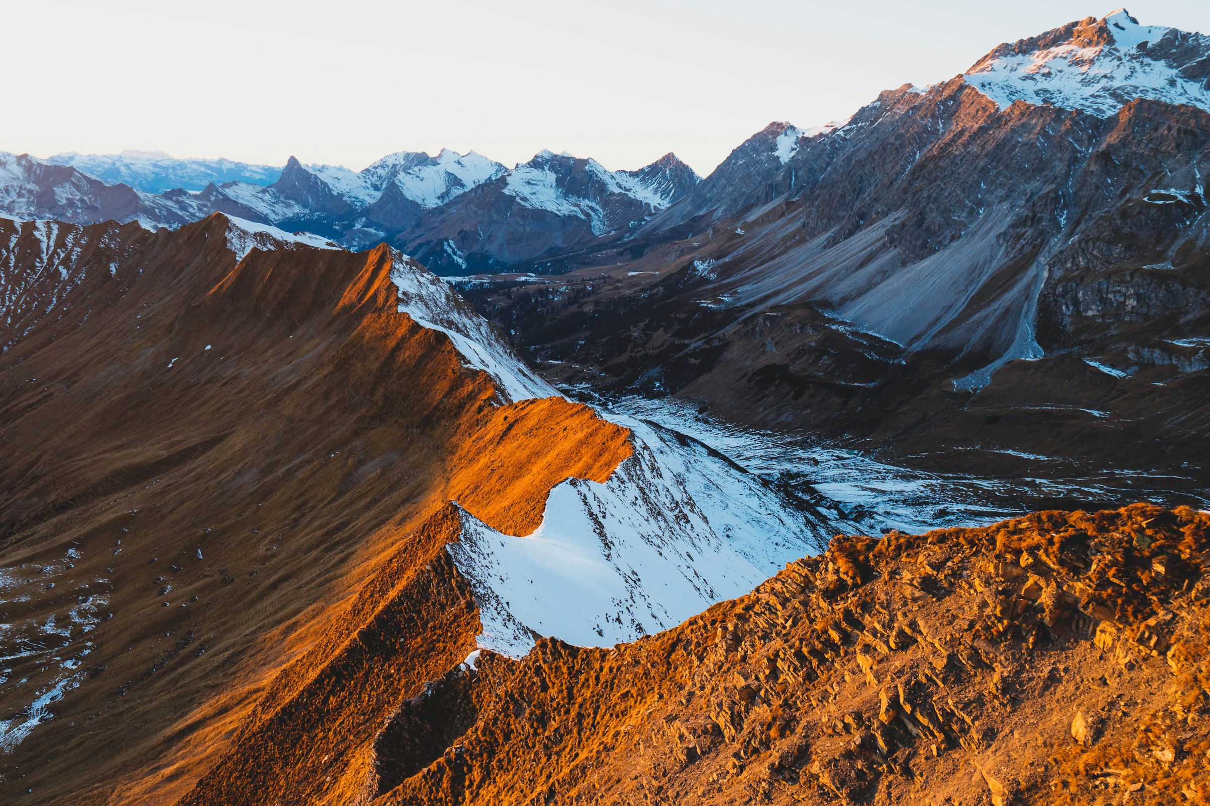 Mountain peaks in golden evening light above Schiers